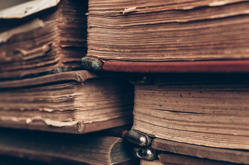 stack of old, worn books
